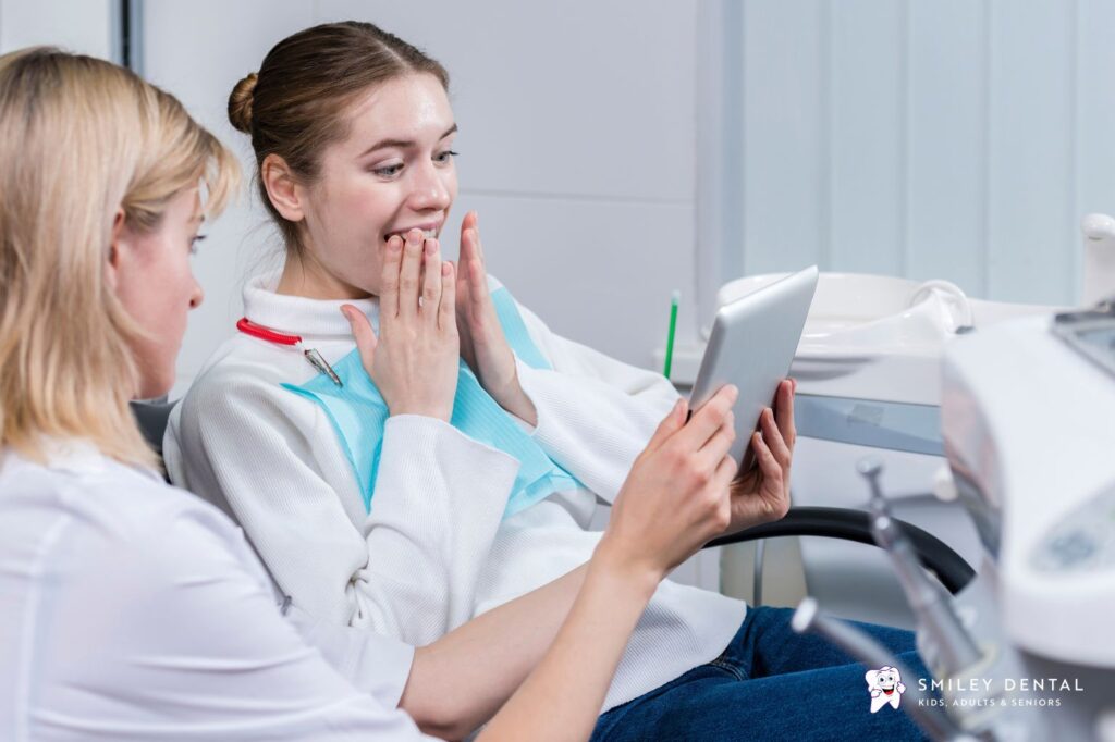 Adult patient discussing MassHealth dental benefits with a dentist in Massachusetts