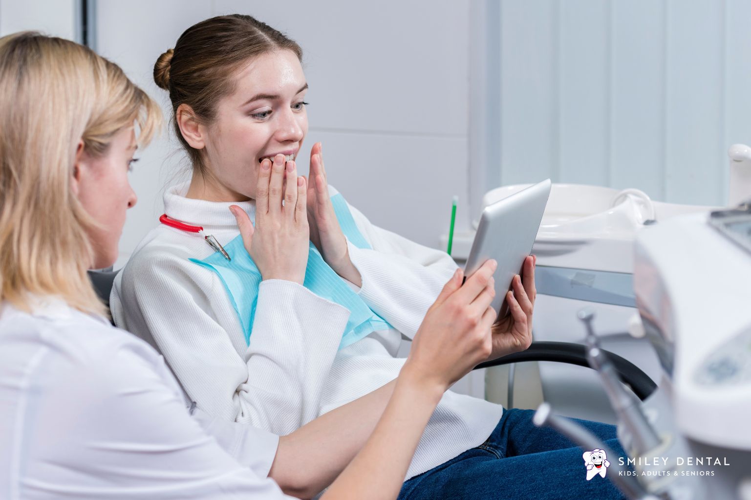 Adult patient discussing MassHealth dental benefits with a dentist in Massachusetts